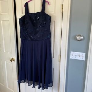 Beautiful true navy blue formal dress.  Mid calf to below the knee